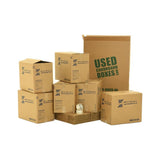 Various sizes of used moving and storage boxes shown assembled and flattened, along with included tape rolls, in a Medium Moving Boxes Kit by UsedCardboardBoxes.