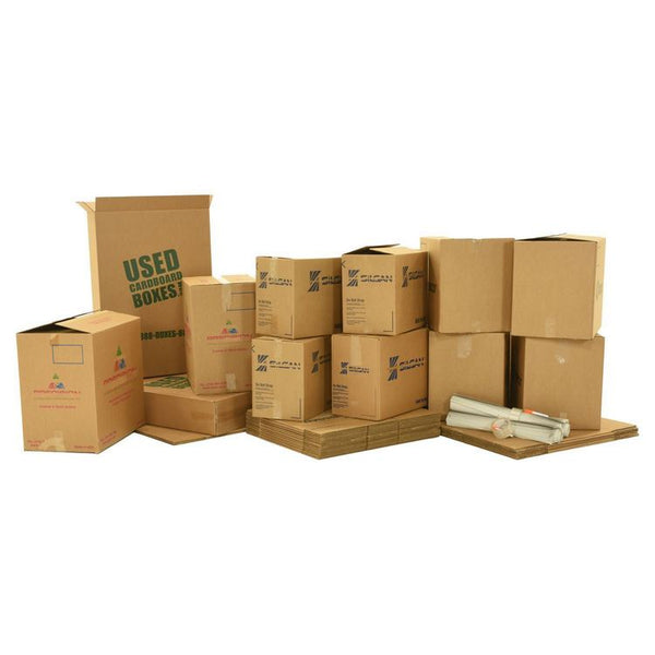 Various sizes of used moving and storage boxes shown assembled and flattened, along with included supplies, in a 1 Bedroom Moving Kit by UsedCardboardBoxes.
