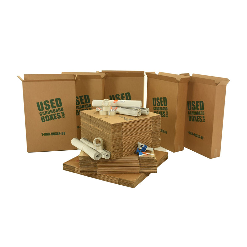 Various sizes of used moving and storage boxes shown flattened, along with included supplies, in a 4 Bedroom Moving Kit by UsedCardboardBoxes.