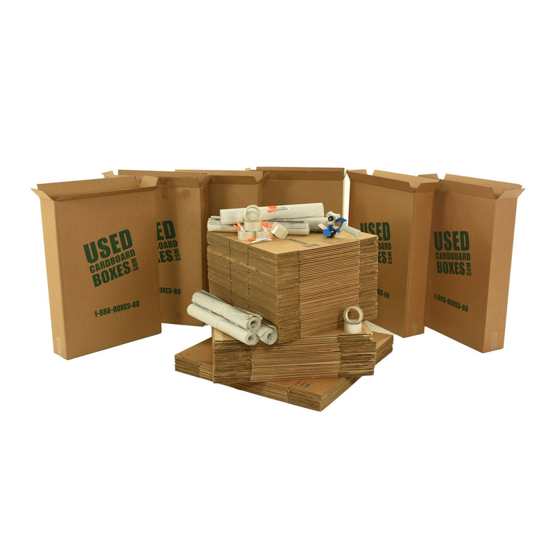 Various sizes of used moving and storage boxes shown flattened, along with included supplies, in an 8 Bedroom Moving Kit by UsedCardboardBoxes.
